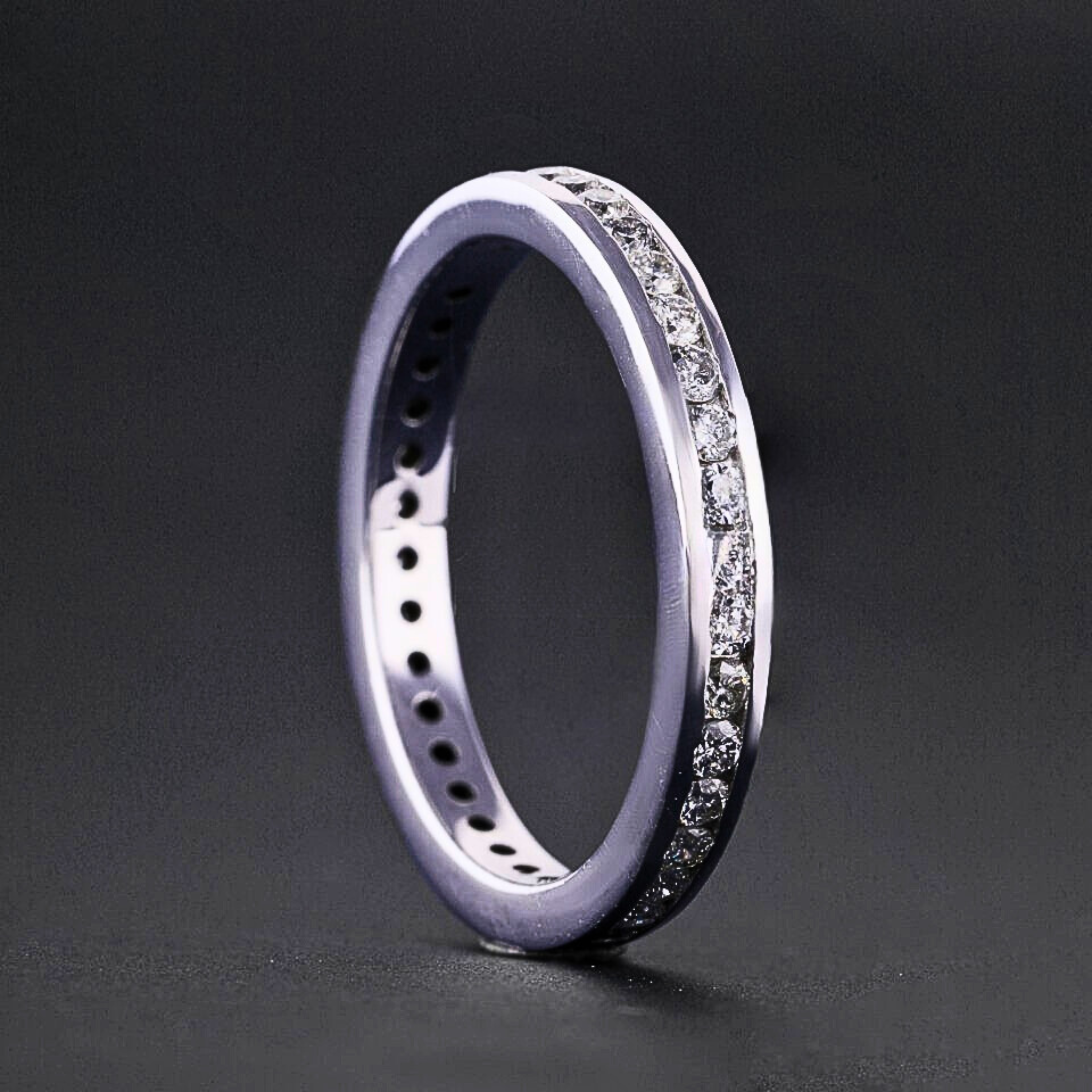 Channel Set Round Diamond Wedding Band.