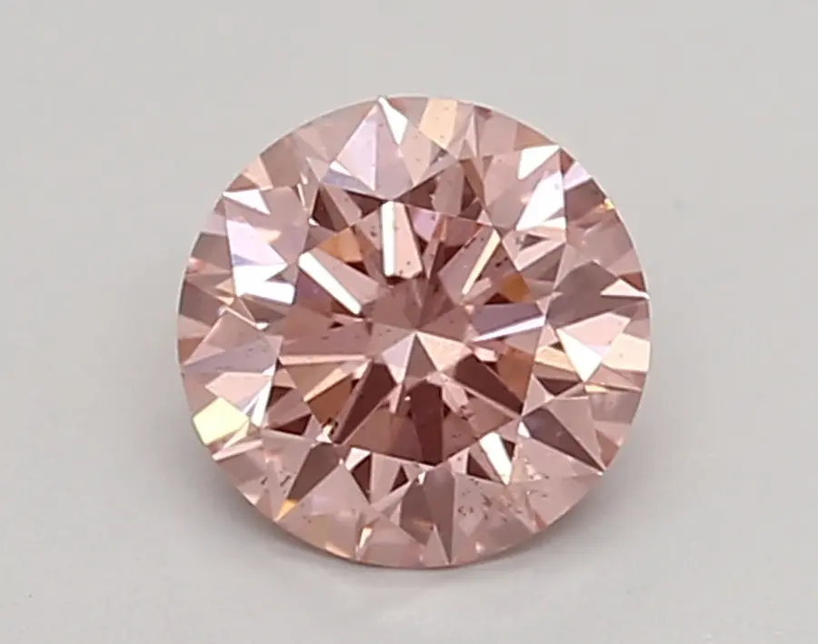 0.69ct FANCY INTENSE  PINK SI1 Round (IGI)