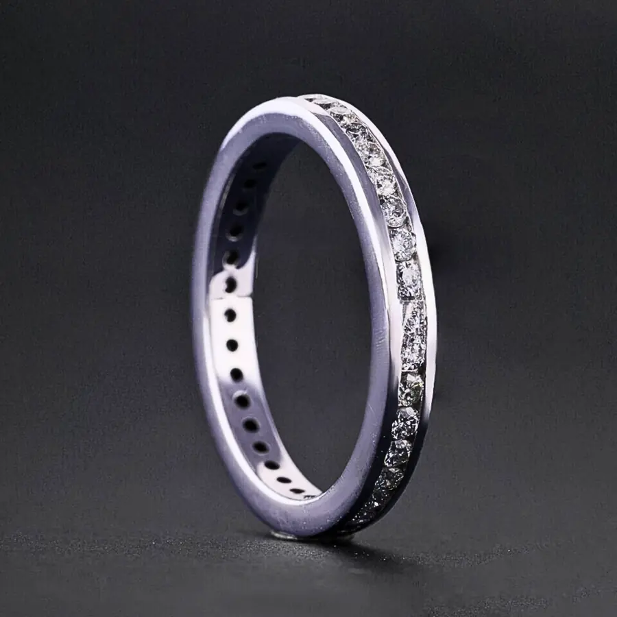 Channel Set Round Diamond Wedding Band.