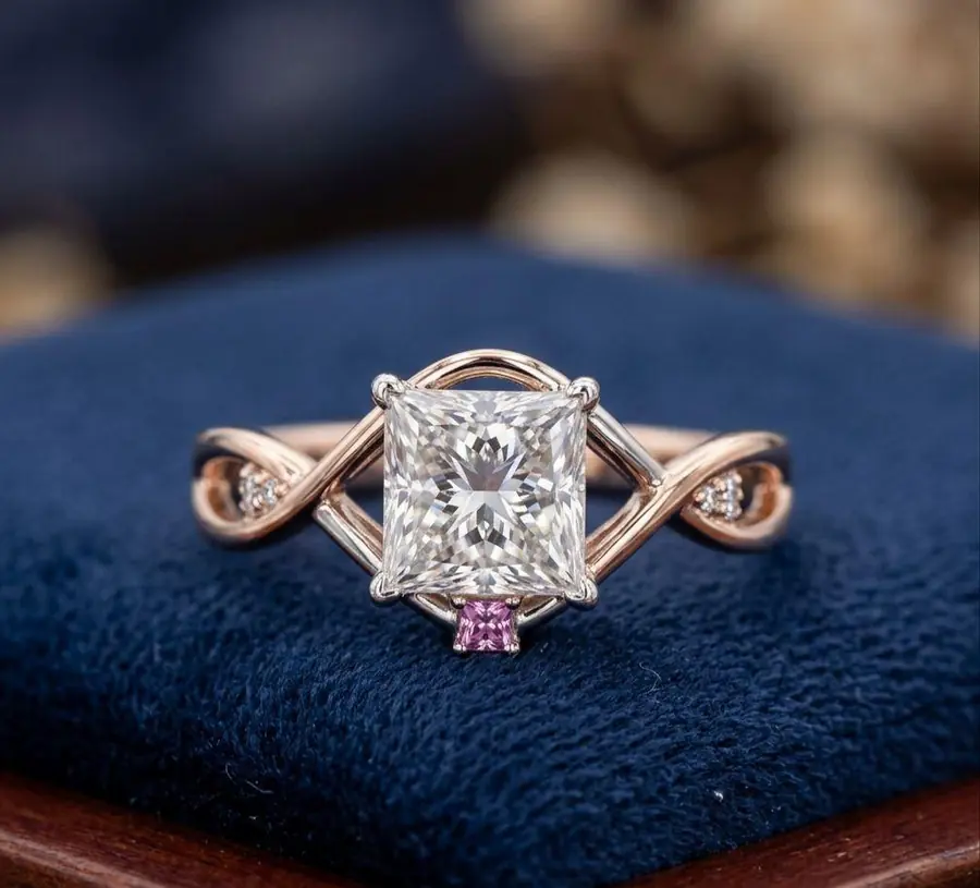 The rose gold framework is elevated, allowing the stones to sit proudly while maintaining a comfortable, low-profile feel on