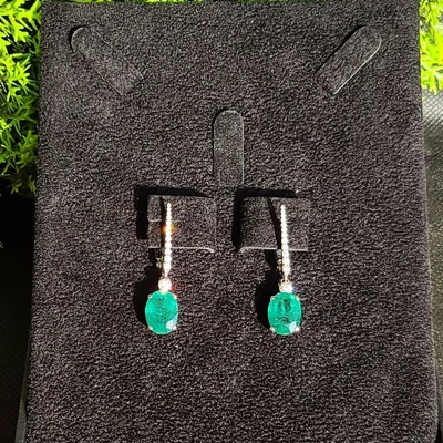 6.82 ct Emerald Oval Cut Earrings with Diamonds