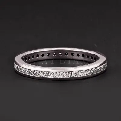 Channel Set Round Diamond Wedding Band.