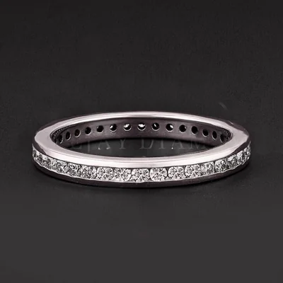 Channel Set Round Diamond Wedding Band.