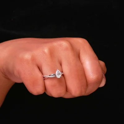 Pear Cut Lab Grown Diamond Engagement Ring With Twisted Pave Band