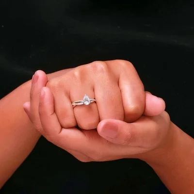 Pear Cut Lab Grown Diamond Engagement Ring With Twisted Pave Band