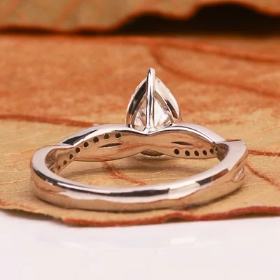 Pear Cut Lab Grown Diamond Engagement Ring With Twisted Pave Band