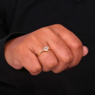 East-West Lozenge Cut Lab Grown Diamond Solitaire Ring in Bezel Setting