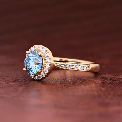 Blue Round Cut Lab Grown Diamond Halo Engagement Ring with Pave Band