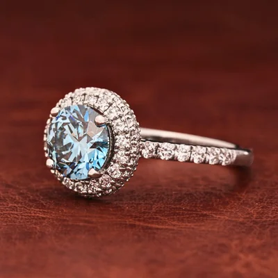 Blue Round Brilliant Cut Lab Grown Diamond Halo Engagement Ring with Pavé Shank