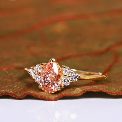 Orange Pear Cut Lab Grown Diamond Ring with Round Side Diamonds