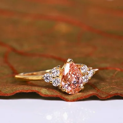 Orange Pear Cut Lab Grown Diamond Ring with Round Side Diamonds