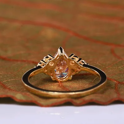 Orange Pear Cut Lab Grown Diamond Ring with Round Side Diamonds