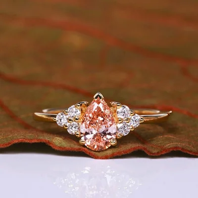 Orange Pear Cut Lab Grown Diamond Ring with Round Side Diamonds